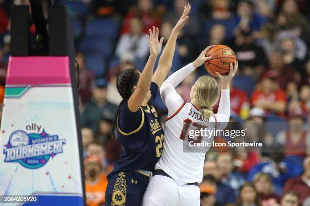 Notre Dame Fighting Irish forward Kylee Watson contests the shot by Virginia Tech Hokies center Clara Strack during the college basketball game...