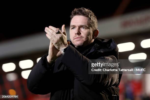 Manchester United Head Coach / Manager Marc Skinner applauds the fans at the end of the Adobe Women's FA Cup Quarter Final match between Brighton &...
