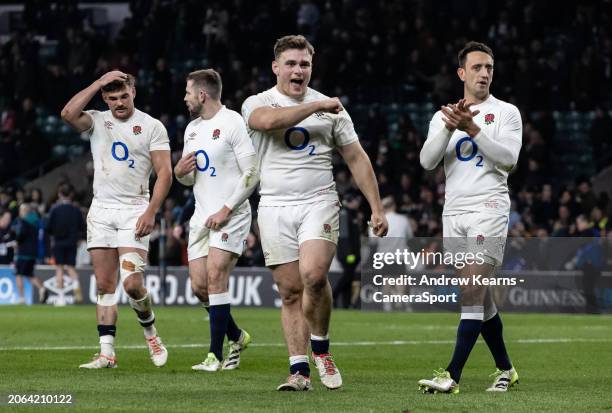 England's George Furbank , Elliot Daly , Theo Dan and Alex Mitchell celebrate victory at the end of the match during the Guinness Six Nations 2024...