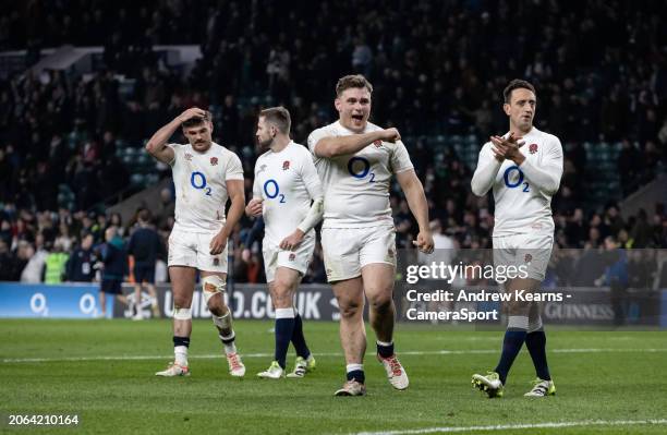 England's George Furbank , Elliot Daly , Theo Dan and Alex Mitchell celebrate victory at the end of the match during the Guinness Six Nations 2024...