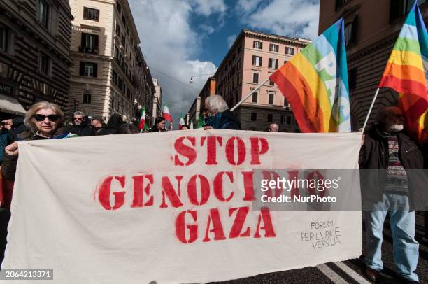 People are participating in a demonstration organized by the Network for Disarmament and the CGIL trade union for the freedom to demonstrate, for a...
