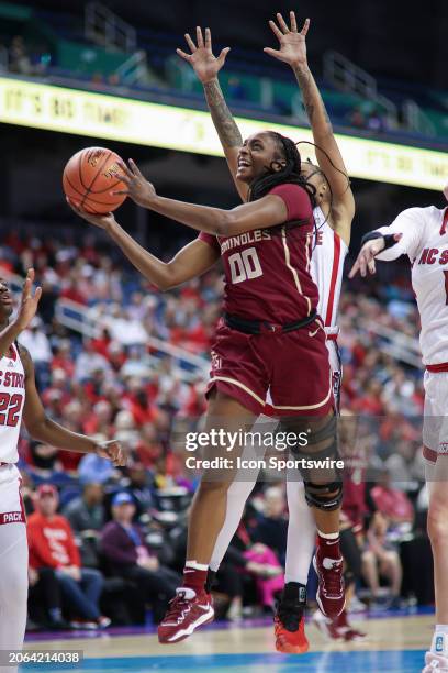 Florida State Seminoles guard Ta'Niya Latson goes up for the lay up during the college basketball game between the NC State Wolfpack and the Florida...