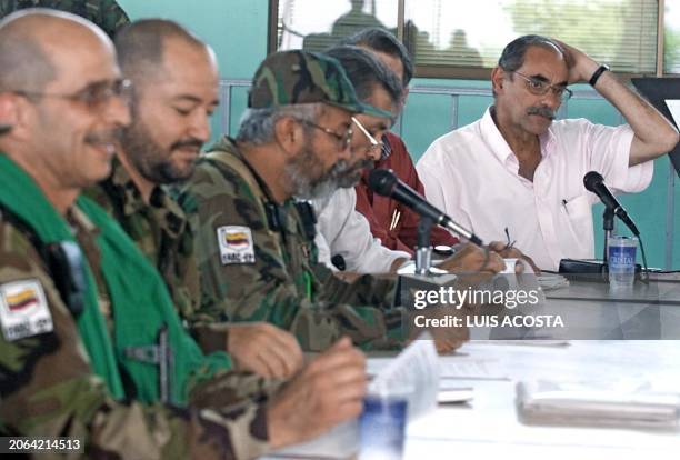 Horacio Serpa , candidate for the Liberal Colombiano political party, seen next to Eduardo Verano de la Rosa at a meeting with Raul Reyes , Carlos...