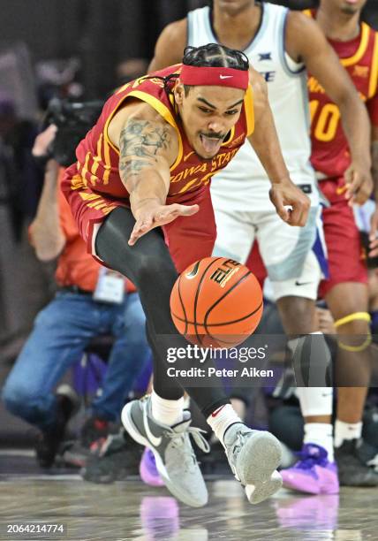 Robert Jones of the Iowa State Cyclones scrambles for a loose ball in the second half against the Kansas State Wildcats at Bramlage Coliseum on March...