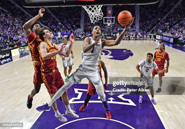 David N'Guessan of the Kansas State Wildcats drives to the basket against Milan Momcilovic of the Iowa State Cyclones in the first half at Bramlage...