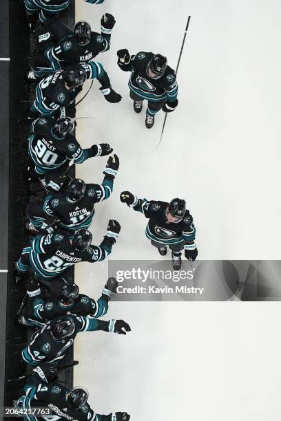 An overhead view as Thomas Bordeleau of the San Jose Sharks celebrates scoring a goal against the Ottawa Senators at SAP Center on March 9, 2024 in...