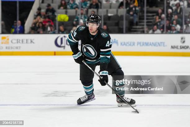 Marc-Edouard Vlasic of the San Jose Sharks skates with the puck in the first period against the Ottawa Senators at SAP Center on March 9, 2024 in San...