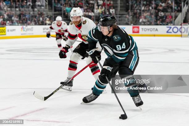 Alexander Barabonav of the San Jose Sharks skates with the puck in the first period against the Ottawa Senators at SAP Center on March 9, 2024 in San...