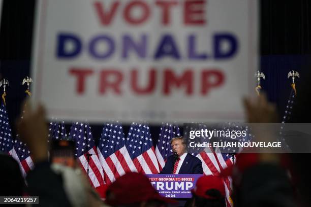 Former US President and 2024 presidential hopeful Donald Trump speaks during a campaign event in Rome, Georgia, on March 9, 2024.