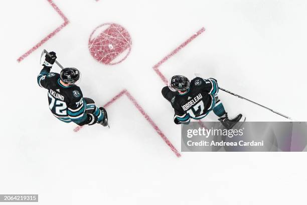 An overhead shot of Thomas Bordeleau of the San Jose Sharks celebrates a goal in the second period against the Ottawa Senators at SAP Center on March...