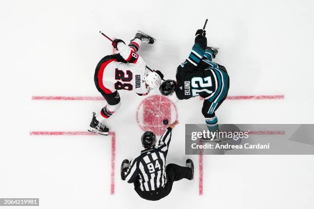 An overhead shot of Claude Giroux of the Ottawa Senators facing off against William Eklund of the San Jose Sharks at SAP Center on March 9, 2024 in...