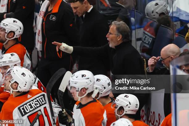 Head coach John Tortorella of the Philadelphia Flyers reacts to being ejected during the first period against the Tampa Bay Lightning at Amalie Arena...