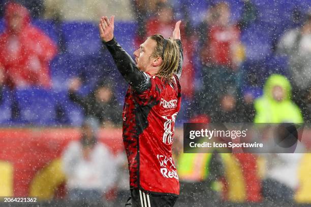 Emil Forsberg of New York Red Bulls celebrates after he scores on a penalty kick during the first half of the Major League Soccer game against FC...