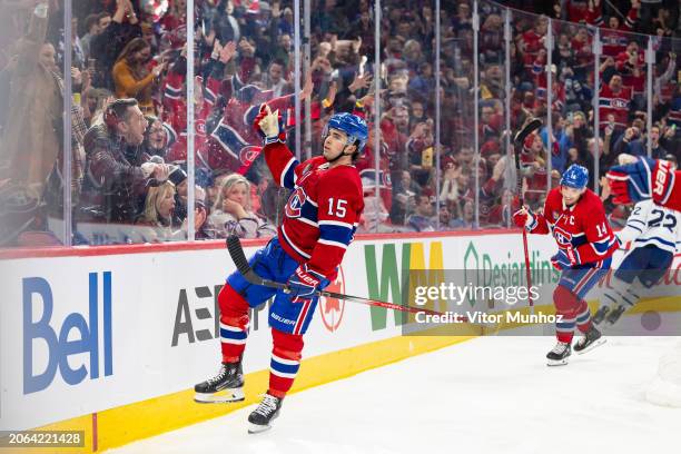 Alex Newhook of the Montreal Canadiens celebrate after a goal during the third period of the NHL regular season game between the Montreal Canadiens...