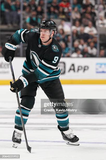 Jacob MacDonald of the San Jose Sharks skates after the puck in the third period against the Ottawa Senators at SAP Center on March 9, 2024 in San...