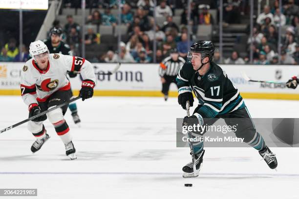 Thomas Bordeleau of the San Jose Sharks skates with the puck in the third period against the Ottawa Senators at SAP Center on March 9, 2024 in San...