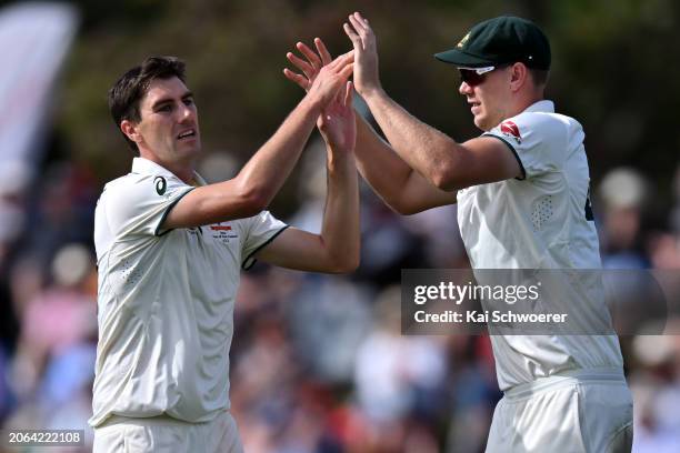 Pat Cummins of Australia is congratulated by team mates after dismissing Tim Southee of New Zealand during day three of the Second Test in the series...