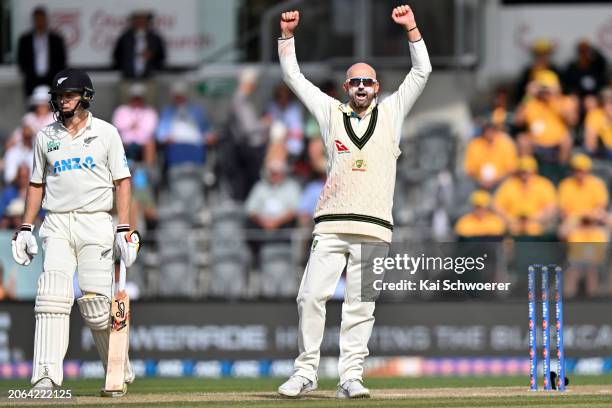 Nathan Lyon of Australia celebrates after dismissing Glenn Phillips of New Zealand during day three of the Second Test in the series between New...