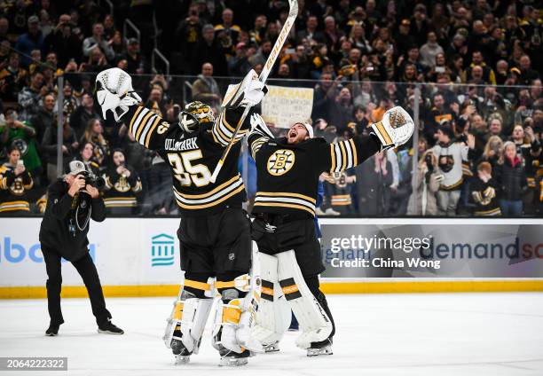 Linus Ullmark of the Boston Bruins and Jeremy Swayman celebrate a win against the Pittsburgh Penguins at TD Garden on March 09, 2024 in Boston,...