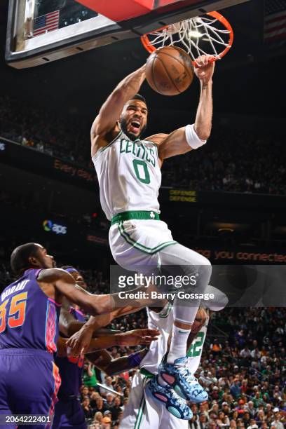 Jayson Tatum of the Boston Celtics dunks the ball during the game against the Phoenix Suns on March 9, 2024 at Footprint Center in Phoenix, Arizona....