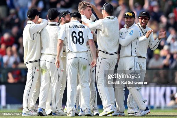 Ben Sears of New Zealand is congratulated by team mates after dismissing Marnus Labuschagne of Australia during day three of the Second Test in the...