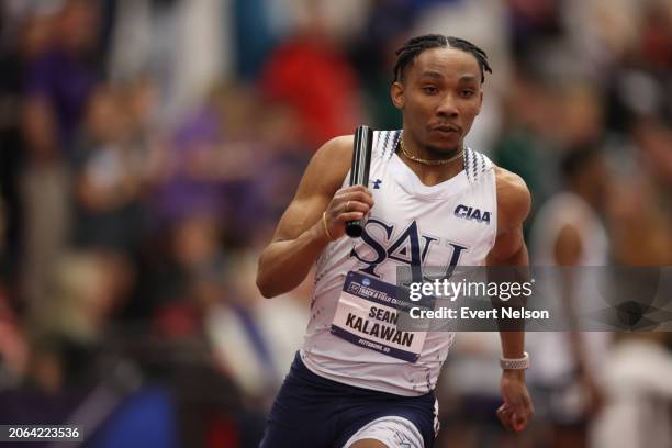 Amarion Harrell of the Saint Augustine's University Falcons competes in the men's 4x400 relay event during the 2024 NCAA Division II Indoor Track and...