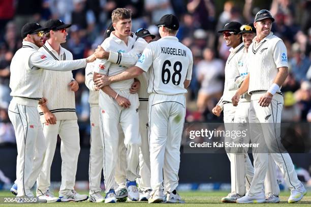 Ben Sears of New Zealand is congratulated by team mates after dismissing Marnus Labuschagne of Australia during day three of the Second Test in the...