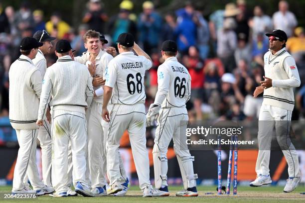 Ben Sears of New Zealand is congratulated by team mates after dismissing Cameron Green of Australia during day three of the Second Test in the series...