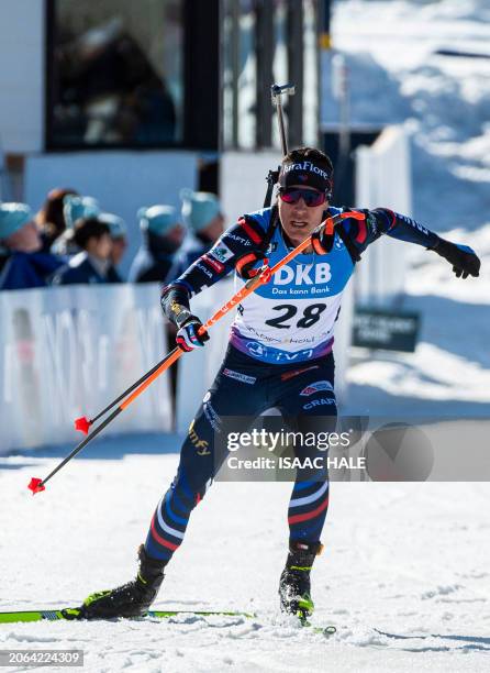 France's Quentin Fillon Maillet sets off on skis after shooting in the men's 10 km sprint during the IBU Biathlon World Cup at Soldier Hollow Nordic...