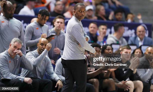 Mike Boyton Jr., head coach of the Oklahoma State Cowboys stares down an official during the first half of their game against the Brigham Young...