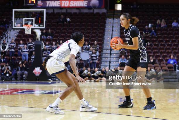Georgetown Hoyas guard Victoria Rivera defended by St. John's Red Storm guard Skye Owen during the Women's Big East Tournament quarterfinals game...