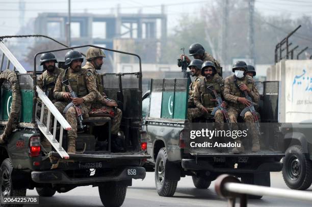 Pakistan security forces inspect the crime scene after 2 killed, 1 injured in northwestern Pakistan blast in Peshawar, Pakistan on March 10, 2024....