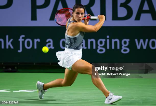 Emma Navarro of the United States in action against Lesia Tsurenko of Ukraine in the second round on Day 7 of the BNP Paribas Open at Indian Wells...