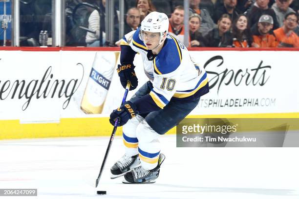 Brayden Schenn of the St. Louis Blues skates with the puck against the Philadelphia Flyers at the Wells Fargo Center on March 04, 2024 in...