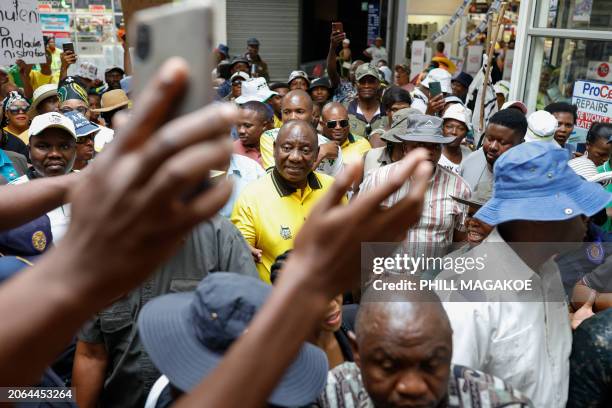 African National Congress president and South African President Cyril Ramaphosa arrives for a walkabout and a meet and greet at the Chris Hani mall...