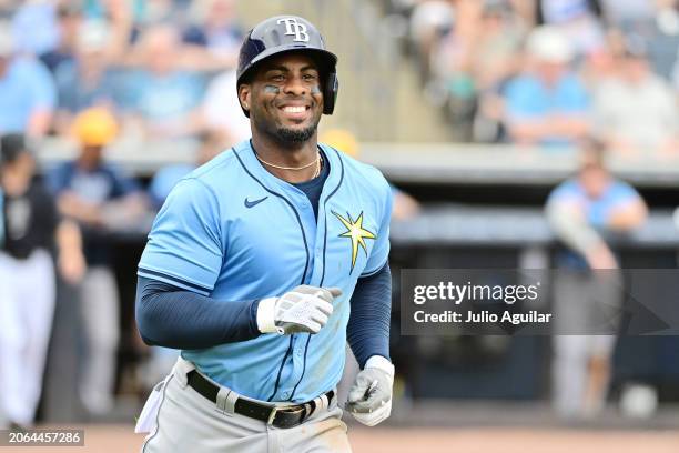 Yandy Diaz of the Tampa Bay Rays reacts after hitting a single in the fifth inning against the New York Yankees during a 2024 Grapefruit League...