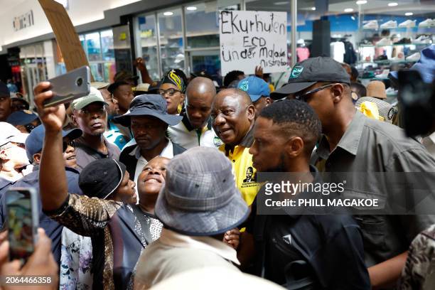 African National Congress president and South African President Cyril Ramaphosa greets supporters during a walkabout and a meet and greet at the...
