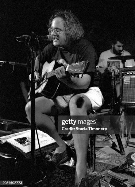 Eugene Chadbourne performs on stage with American rock band Camper Van Beethoven during the period of their collaboration on the 'Camper Van...