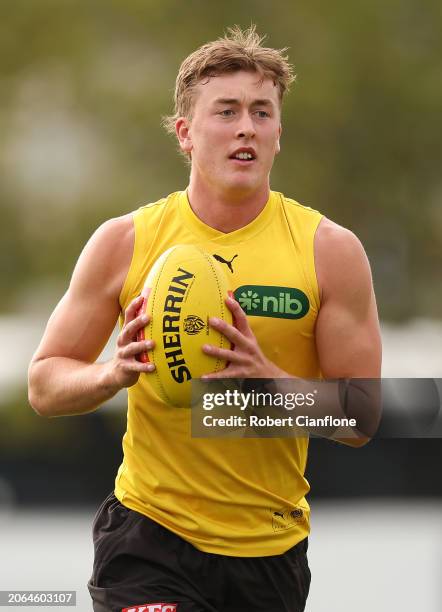 Kane McAuliffe of the Tigers controls the ball during a Richmond Tigers AFL Training Session & Media Opportunity at Punt Road Oval on March 07, 2024...