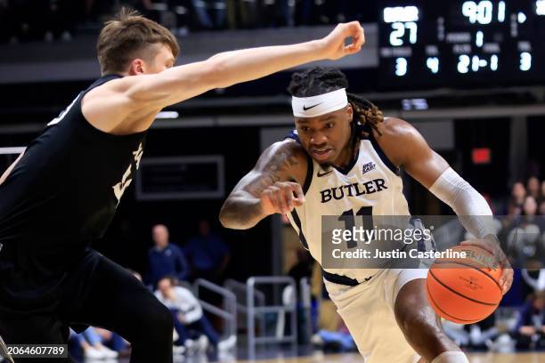 Jahmyl Telfort of the Butler Bulldogs drives to the basket in the game against the Xavier Musketeers during the first half at Hinkle Fieldhouse on...