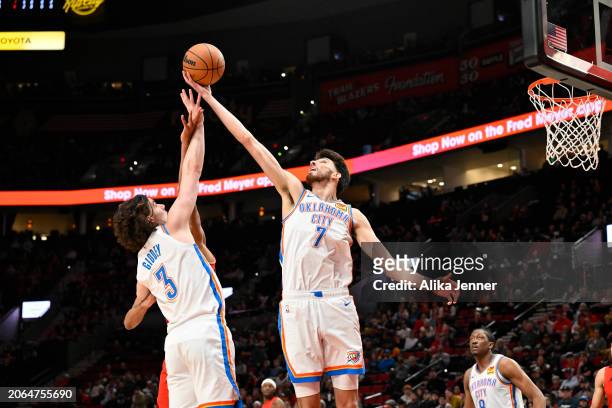 Chet Holmgren of the Oklahoma City Thunder grabs a rebound during the first quarter of the game against the Portland Trail Blazers at the Moda Center...