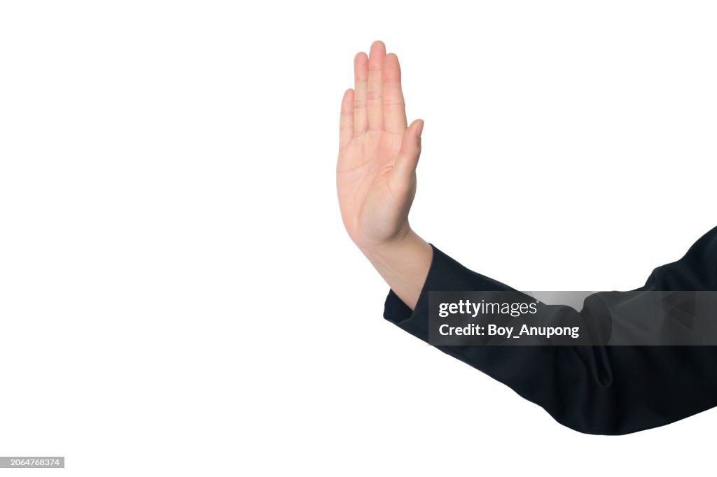 Cropped shot view of business person hand with stop gesture or touching something flat isolated with white background.