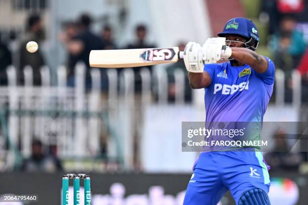 Multan Sultans' Johnson Charles plays a shot during the Pakistan Super League Twenty20 cricket match between Multan Sultans and Islamabad United at...