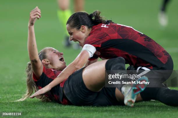 Jordyn Huitema and Jessie Fleming of Canada celebrate after Huitema scored a goal in the second half against the United States during the 2024...
