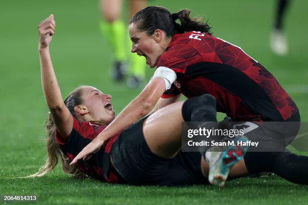 Jordyn Huitema and Jessie Fleming of Canada celebrate after Huitema scored a goal in the second half against the United States during the 2024...