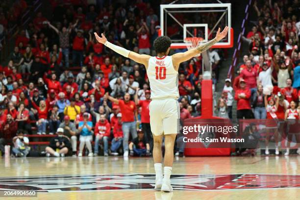 Jaelen House of the New Mexico Lobos celebrates on the court after hitting a 3-pointer against the Fresno State Bulldogs during the second half at...