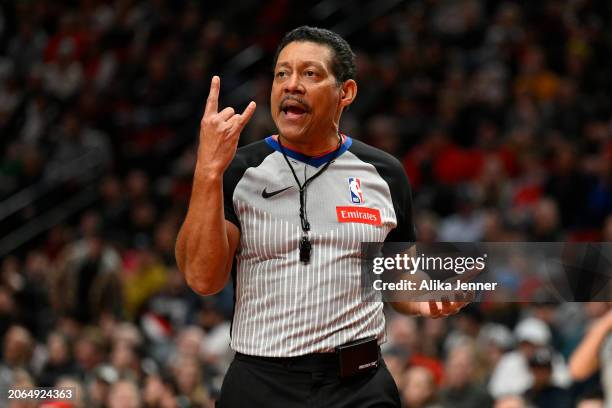 Referee Bill Kennedy gestures during the fourth quarter of the game between the Portland Trail Blazers and the Oklahoma City Thunder at the Moda...