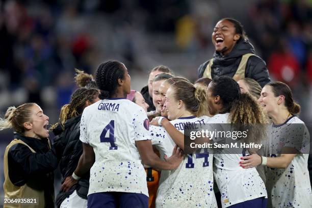 The United States celebrates after beating Canada 2-2 in a penalty shoot-out during the 2024 Concacaf W Gold Cup semifinals at Snapdragon Stadium on...