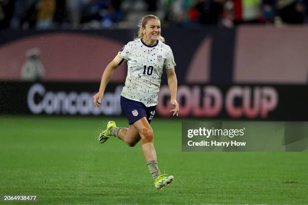 Lindsey Horan of the United States celebrates after beating Canada 2-2 in a penalty shoot-out during the 2024 Concacaf W Gold Cup semifinals at...