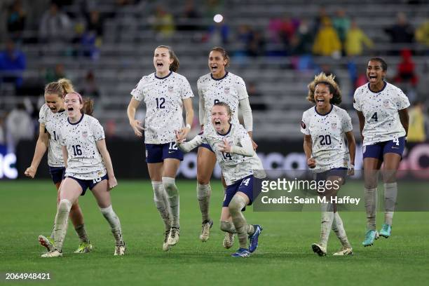 The United States celebrates after beating Canada 2-2 in a penalty shoot-out during the 2024 Concacaf W Gold Cup semifinals at Snapdragon Stadium on...